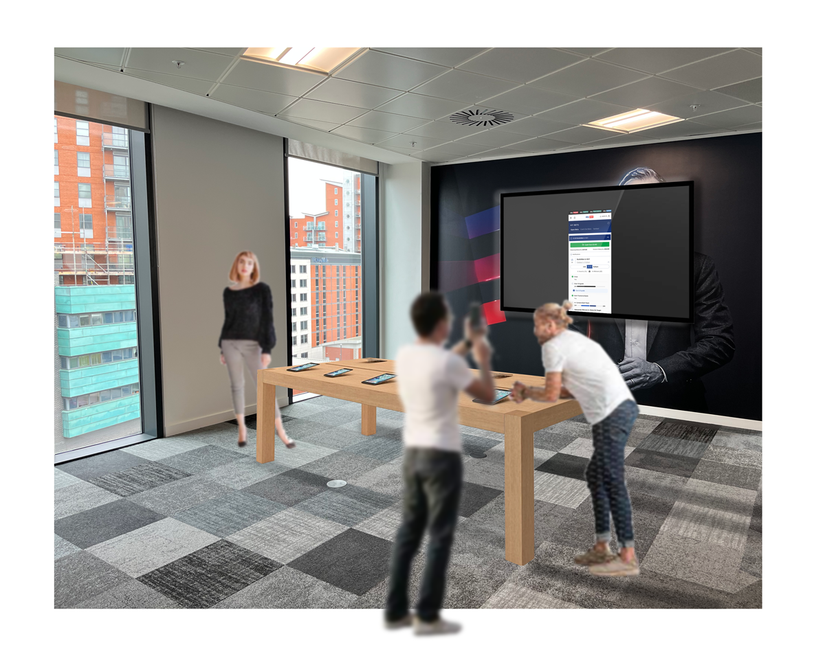 people standing around a table of mobile devices